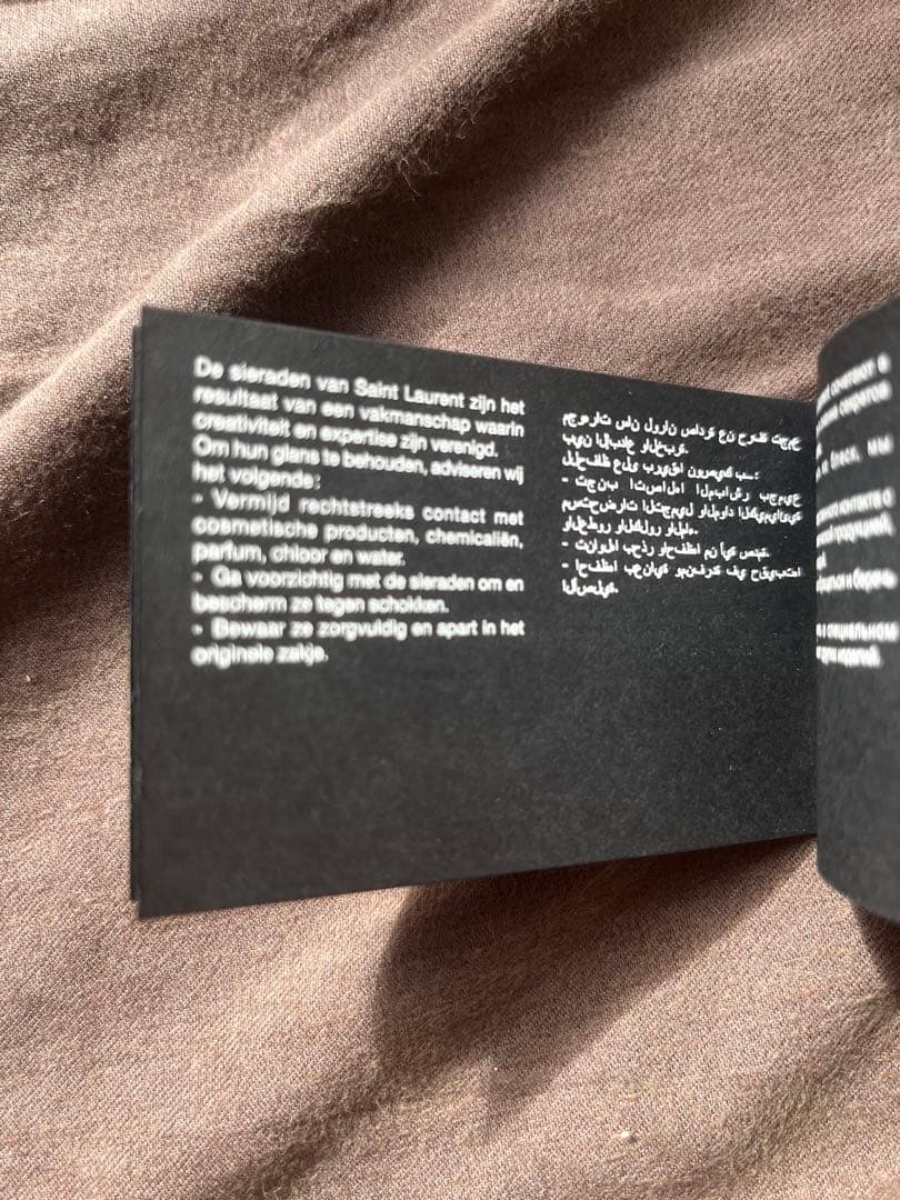 サンローラン ブレスレット モノグラム チャーム ブラス ゴールド　カサンドラ