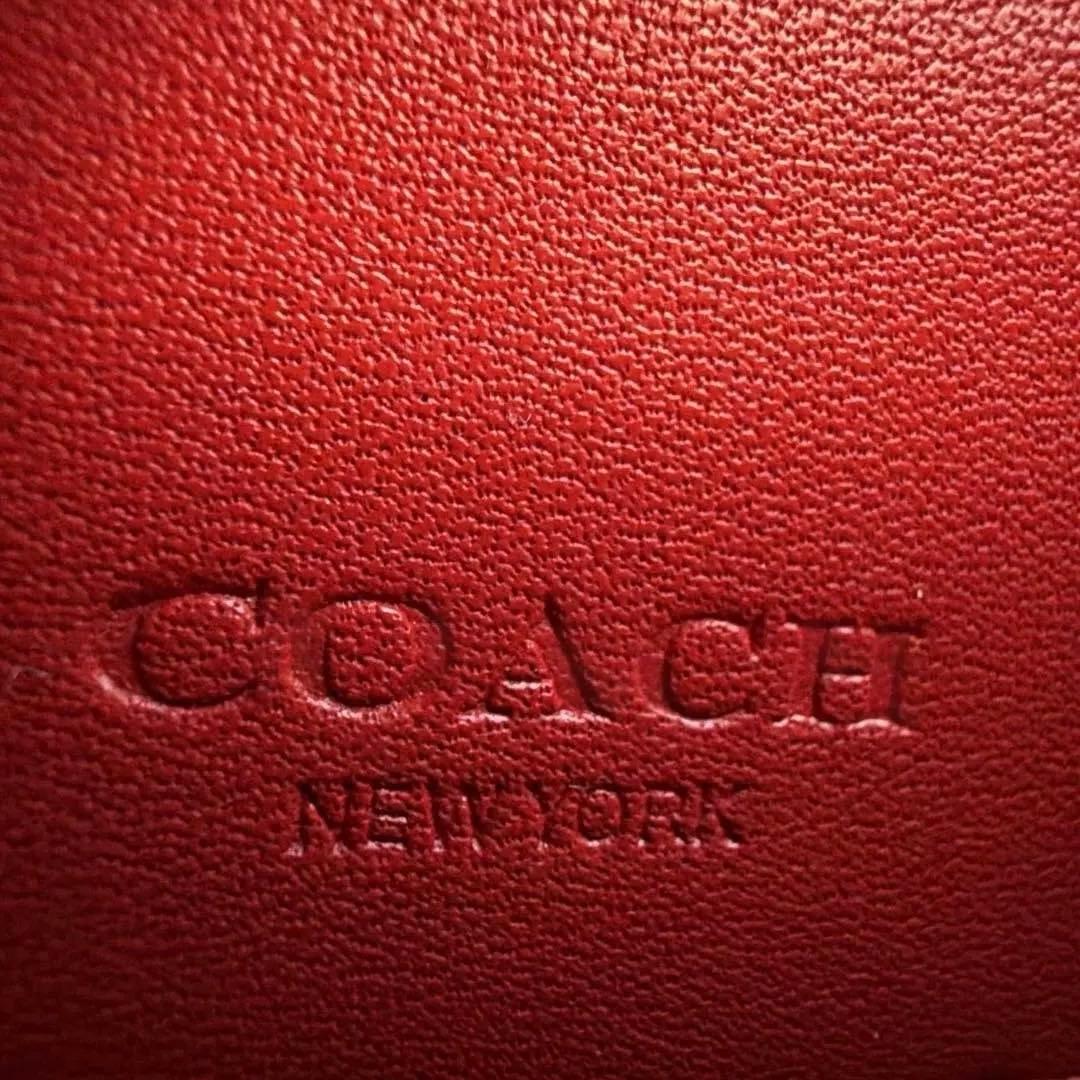 COACH リンゴ柄 二つ折り財布