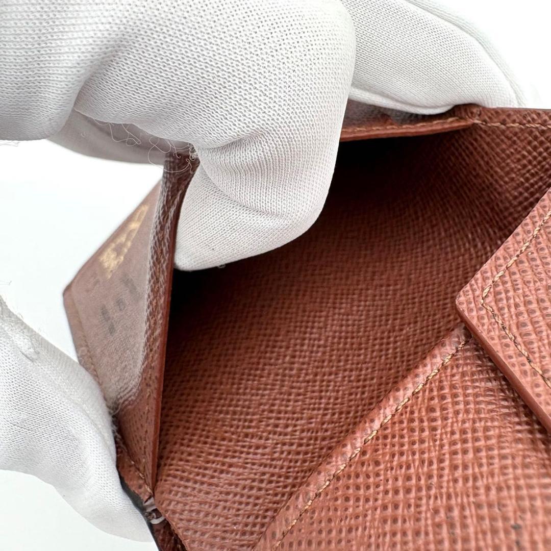 ルイヴィトン 折財布 モノグラム ポルトフォイユ マルコ NM 茶 1973