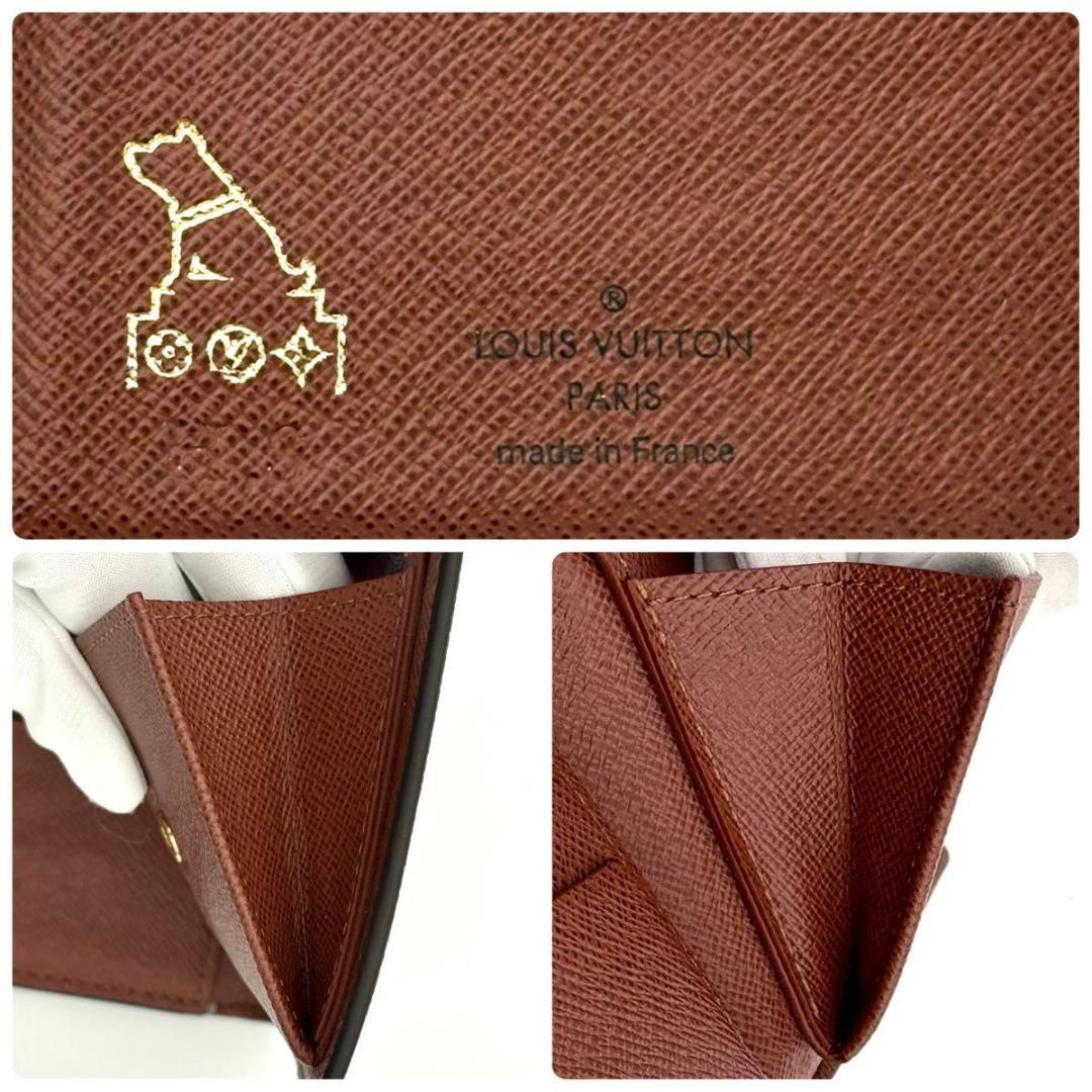 ルイヴィトン 折財布 モノグラム ポルトフォイユ マルコ NM 茶 1973