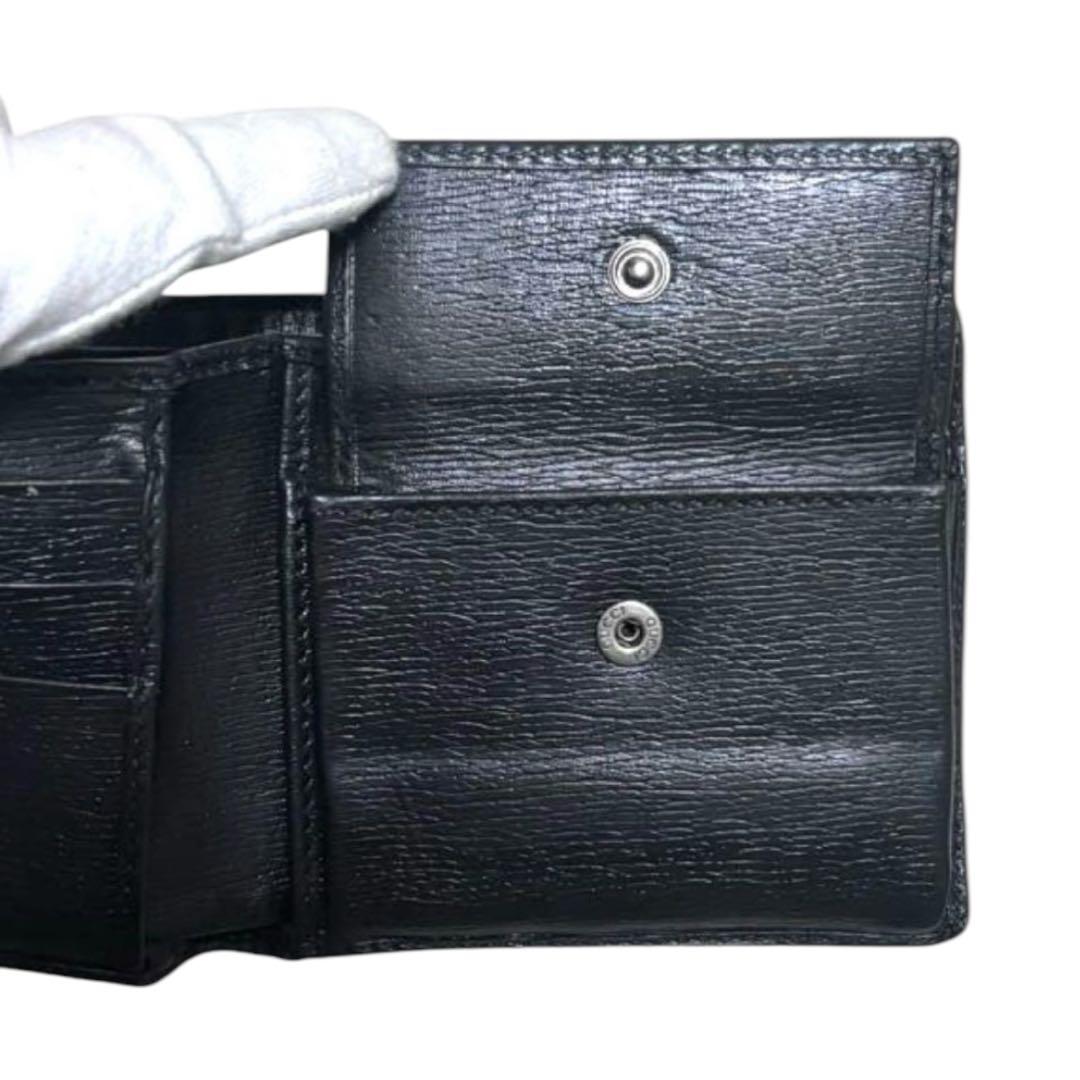 グッチ　折り財布　レザー　ブラック　金属インターロッキング　フラップ