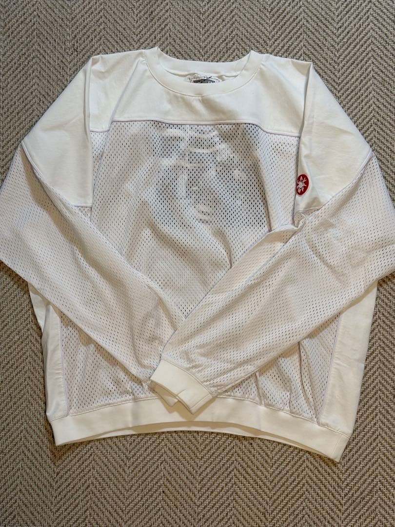 トップス C.E (Cav Empt) MESH TRACK CREW NECK
