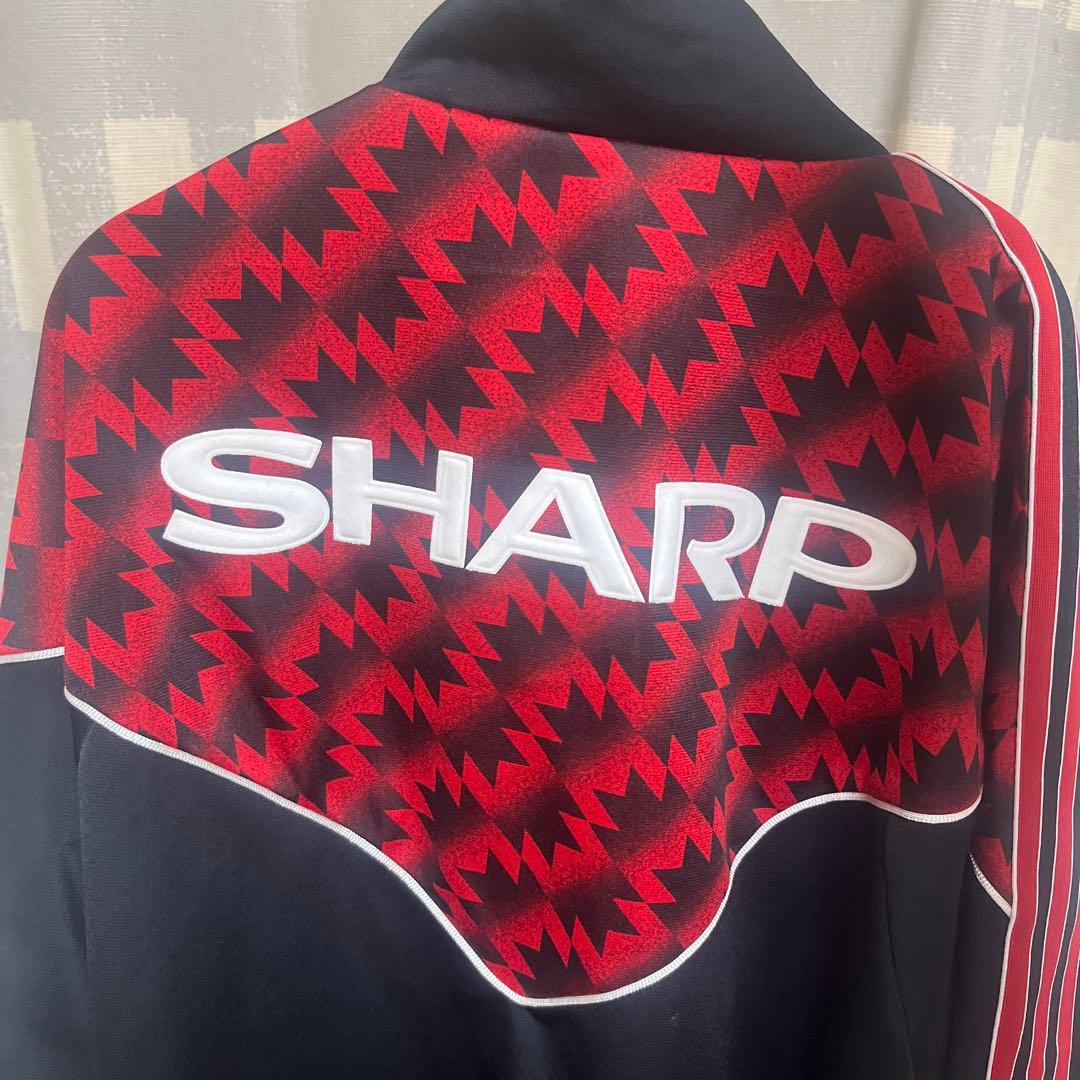 マンチェスター・ユナイテッド 91 年記念トラックトップ