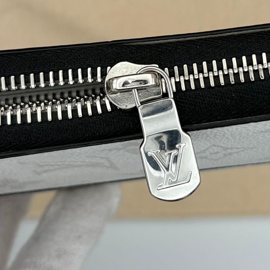 ルイヴィトン　タイガラマ　ヴェルティカル　ジッピーウォレット