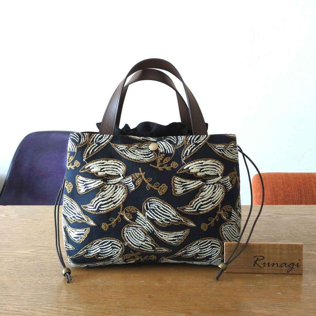 あおりポケットの巾着バッグ＊ミナペルホネン following day