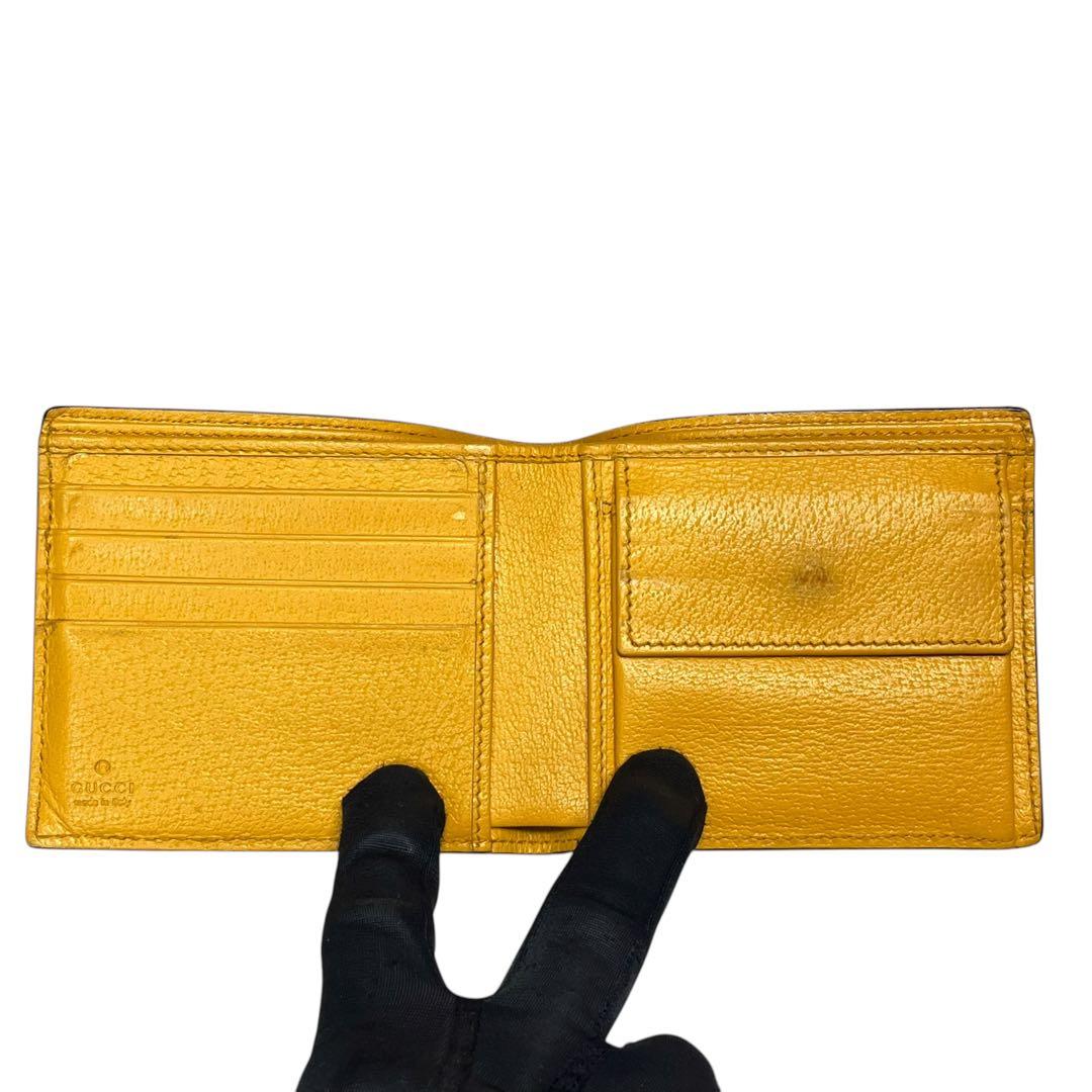 希少✨グッチ 二つ折り財布 カットアウト GG ロゴ インターロッキング PVC