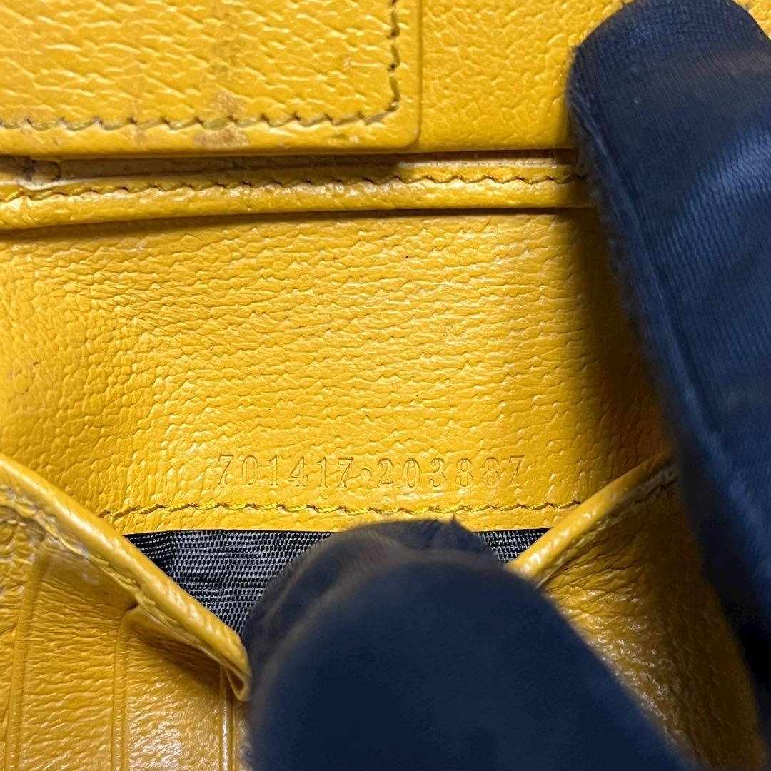 希少✨グッチ 二つ折り財布 カットアウト GG ロゴ インターロッキング PVC