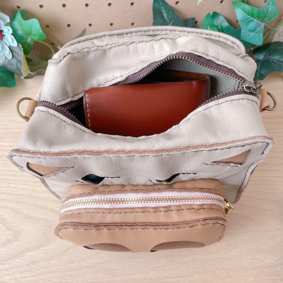 四角い豚のミニバッグ　本革　手縫い　ジト目