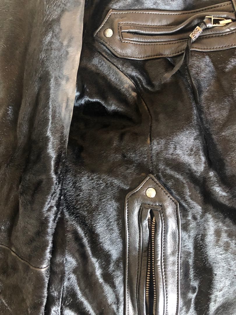 SCHORL 牛革(ハラコ)シングルライダースジャケット