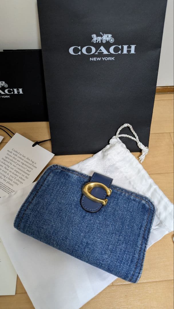 コーチ２つ折り財布タビー