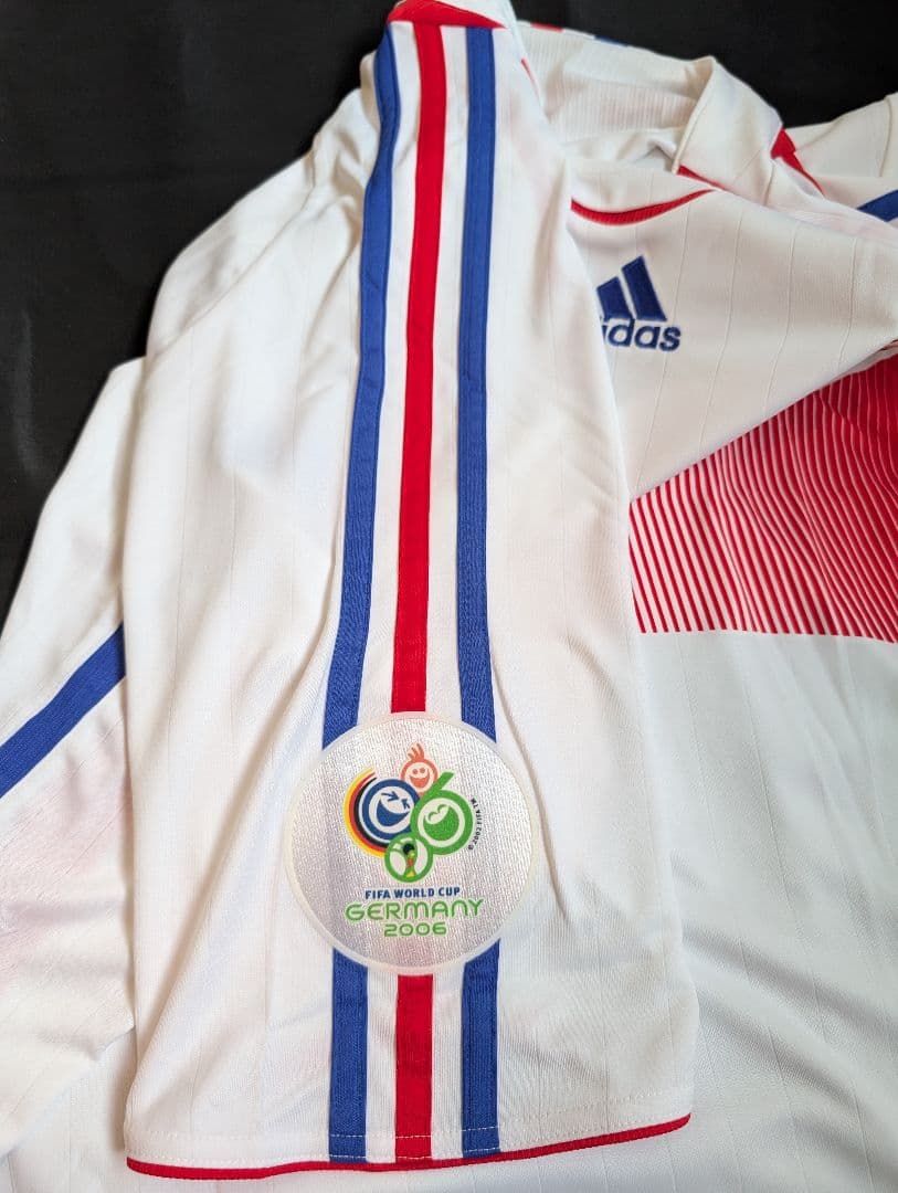 【新品タグ付き】フランス代表/ジネディーヌ・ジダン/A/2006W杯頭突きモデル