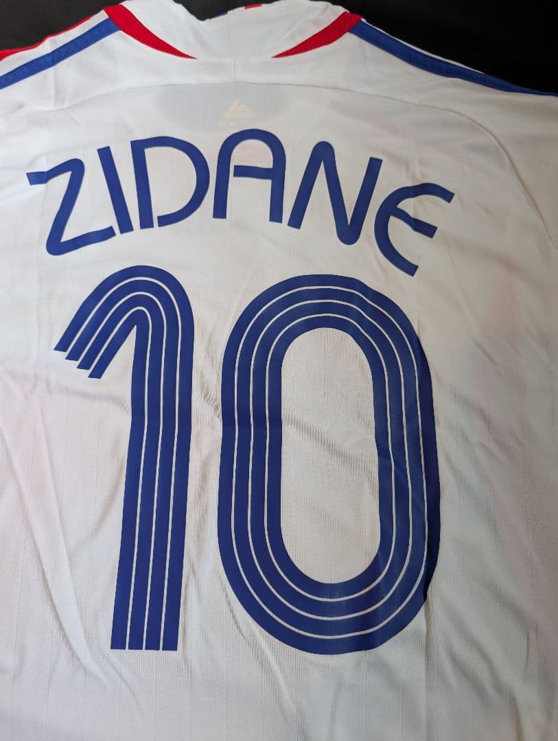 【新品タグ付き】フランス代表/ジネディーヌ・ジダン/A/2006W杯頭突きモデル
