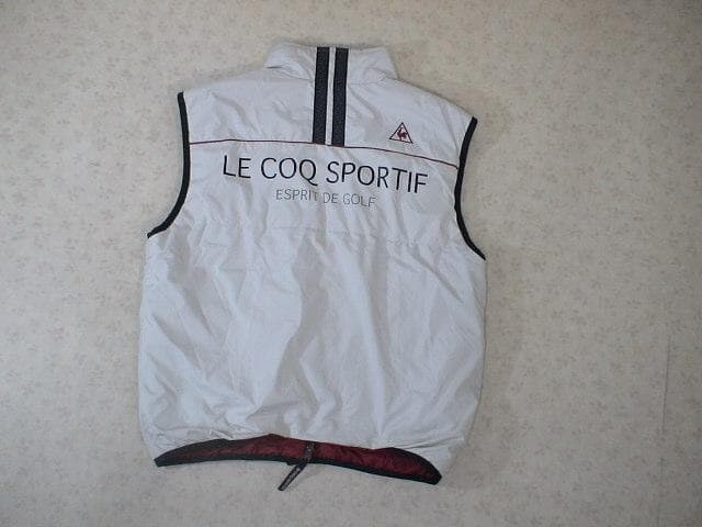 60951　ルコック　ゴルフ用リバーシブルベスト　白×ワインレッド　M