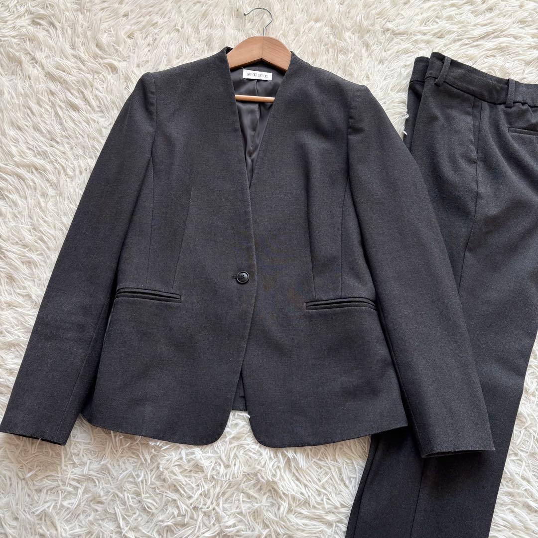 プラステ ウォームリザーブ カラーレス パンツスーツ セットアップM チャコール