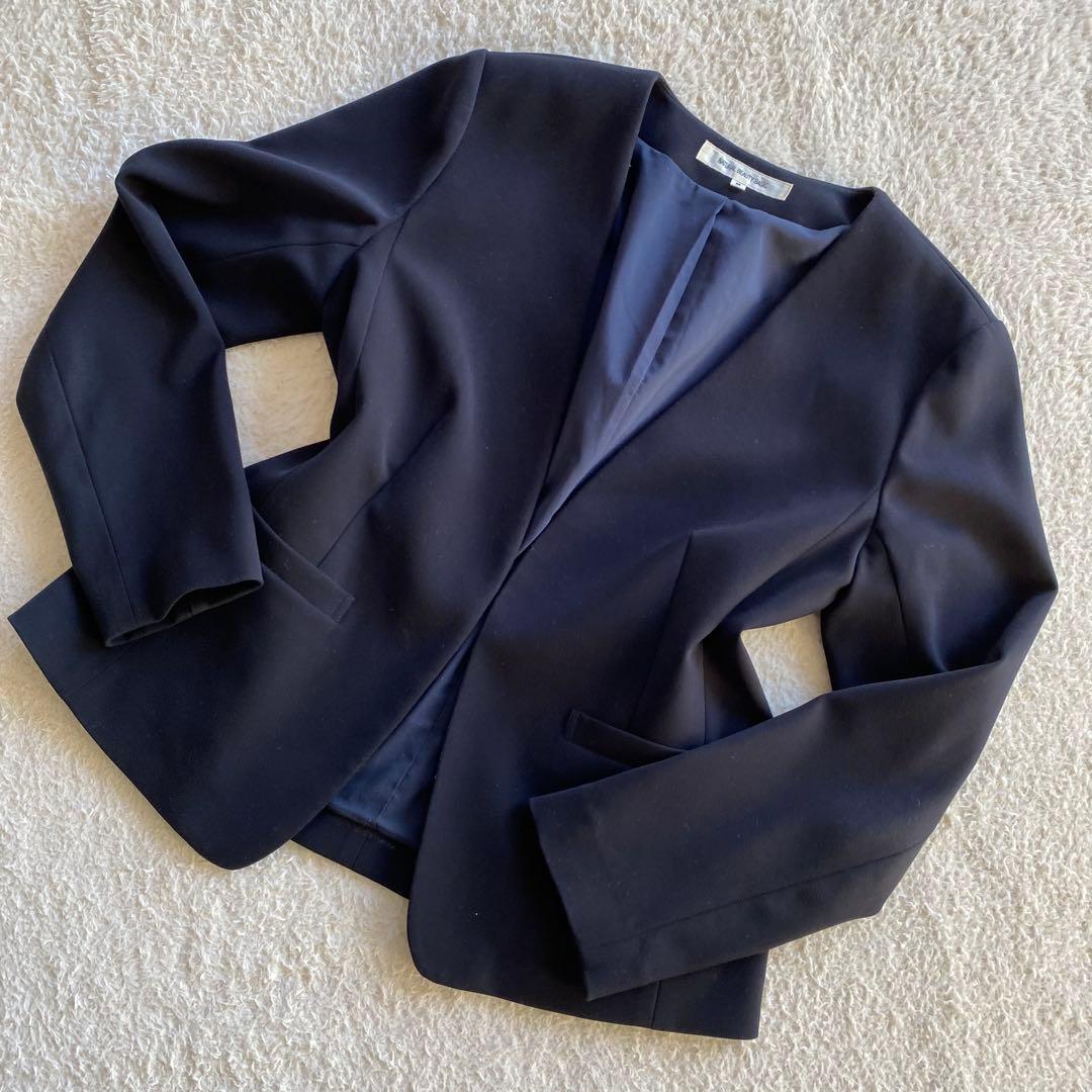 【美品】ナチュラルビューティベーシック パンツスーツ ノーカラー ネイビー Ｍ
