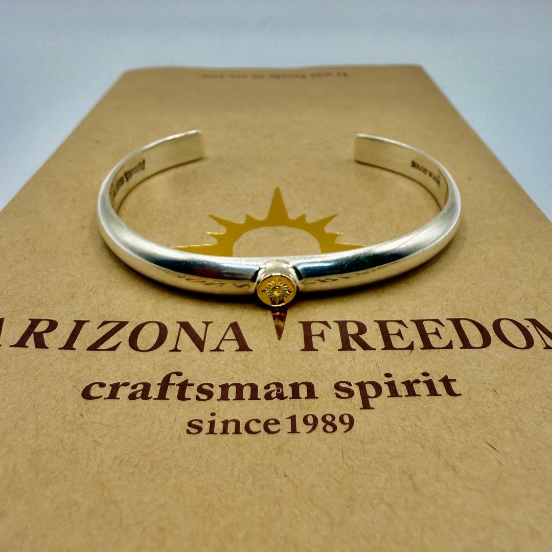 アリゾナフリーダム　k18太陽神付き甲丸バングル　B-15b 定価52690円
