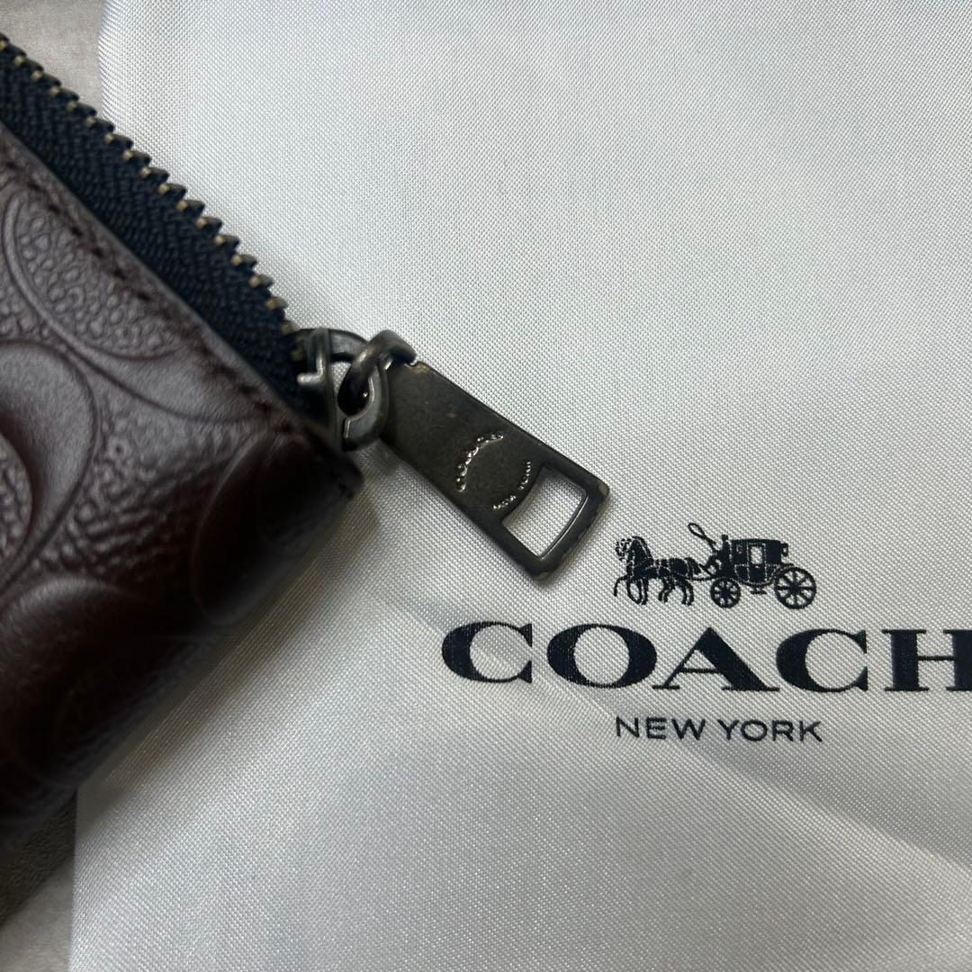 新品未使用 コーチ シグネチャー型押しエンボス レザー ブラウン 長財布