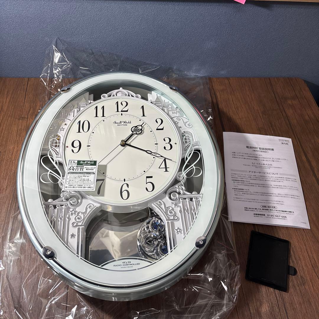リズム掛け時計 電波時計アナログ スモールワールドプラウド 4MN523RH05