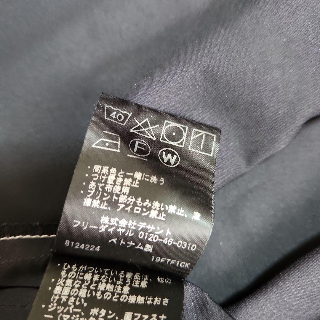 DESCENTE GOLFタイポグラフィモチーフウィンドジャケットストレッチM黒