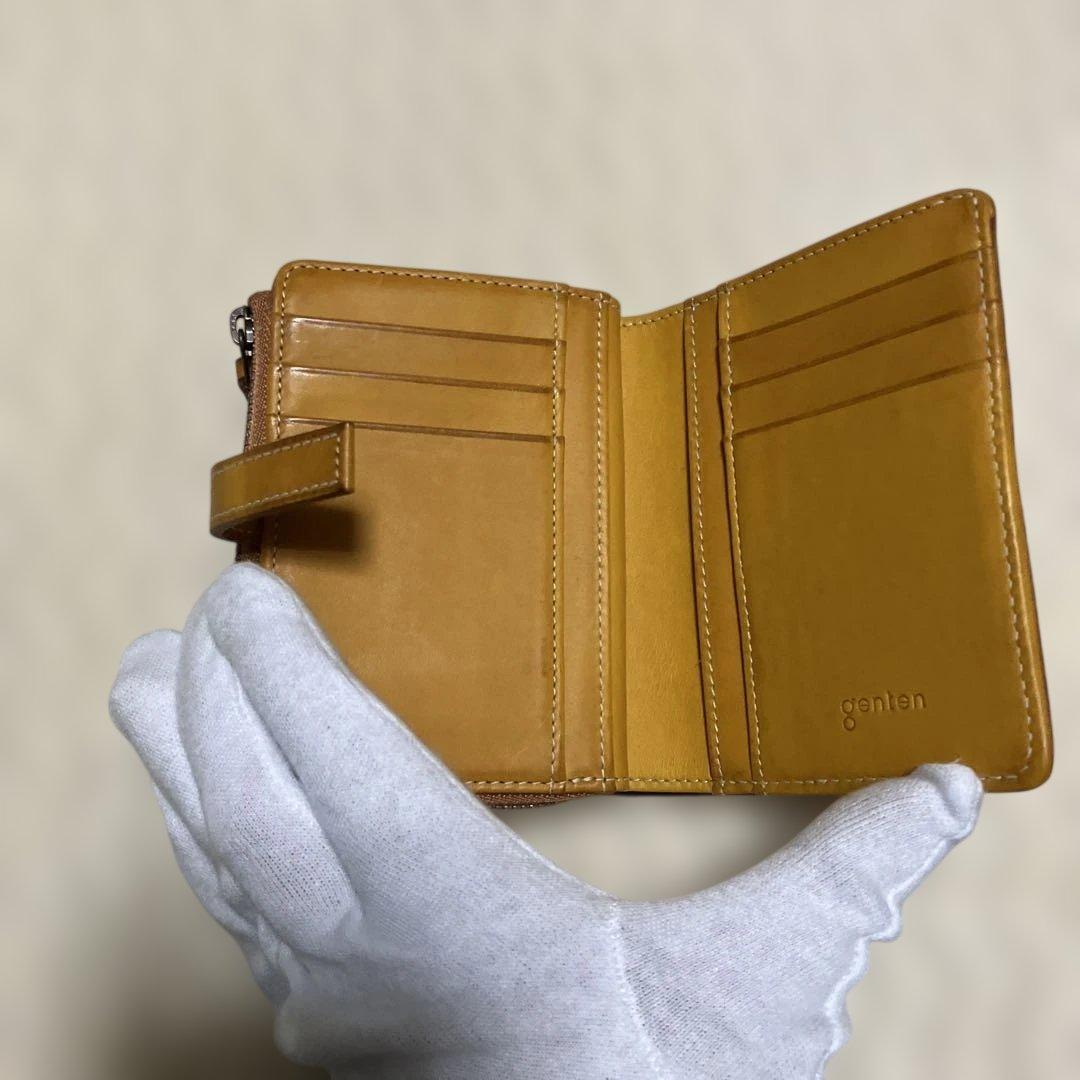 (美品) genten ゲンテン　カットワークレザー　二つ折り財布　オシャレ