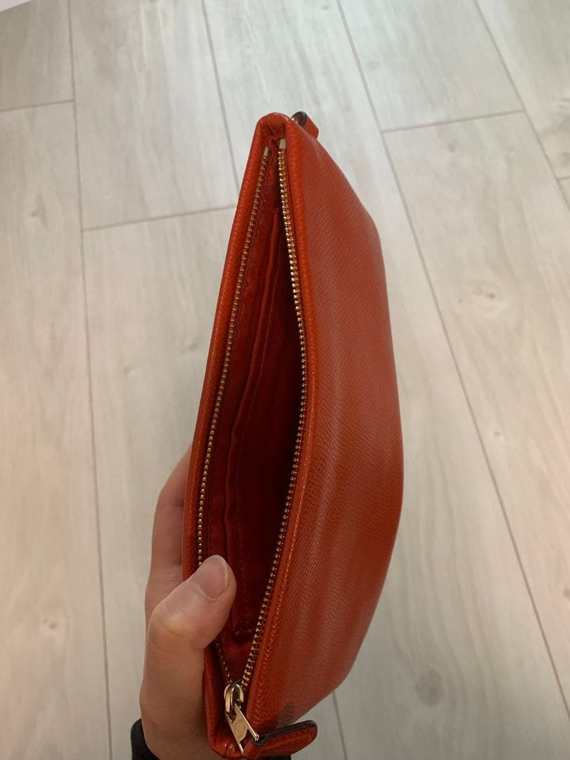 3,000円引！【ほぼ新品】COACHのリストレット/ポーチ（朱色/赤）レザー