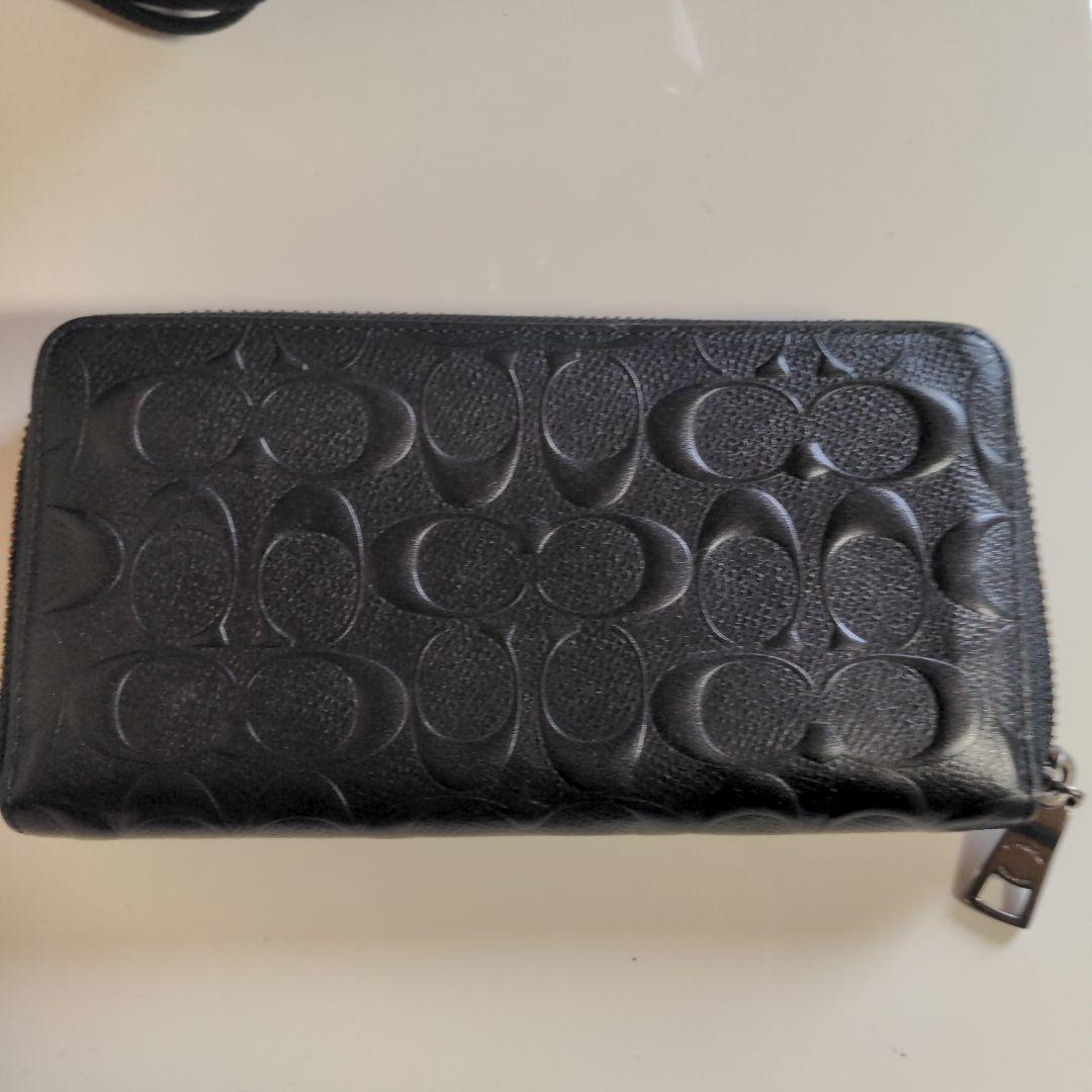 コーチ　COACHブラックpvcレザー エンボス加工 長財布