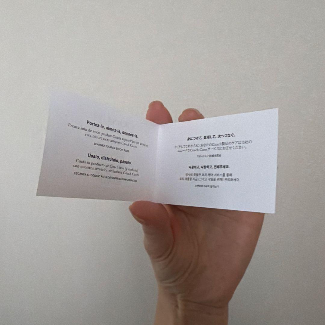 【新品未使用】COACH 二つ折り財布 ライトブルー