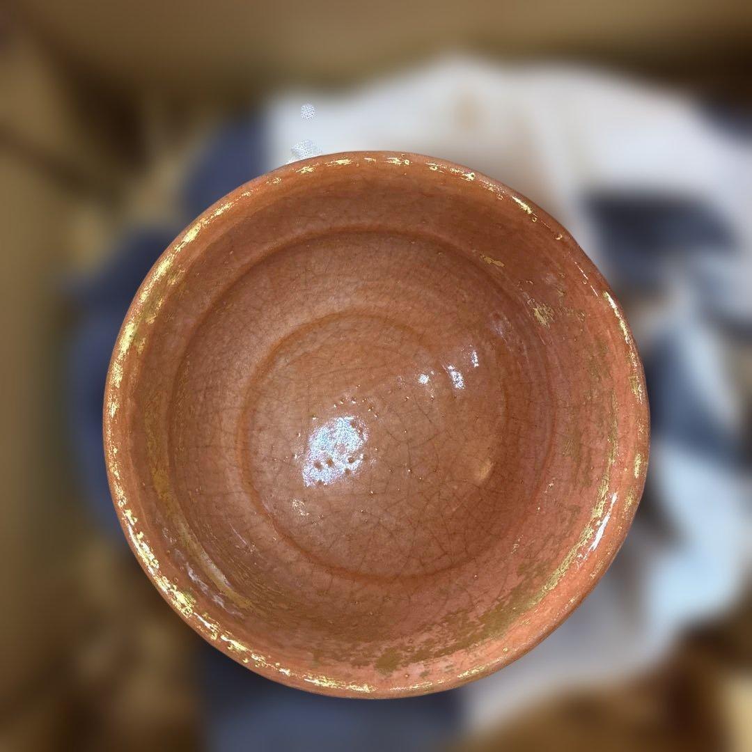 オレンジ陶器ボウル 金色の縁取り