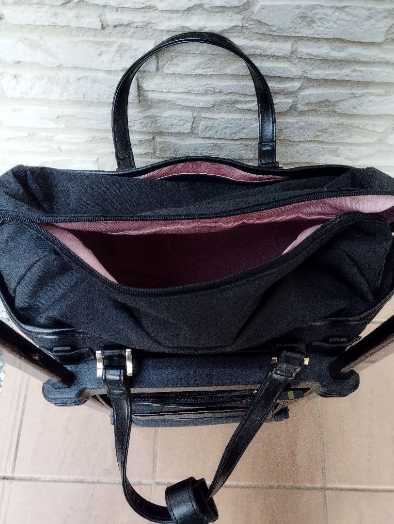 お揃いのポシェットつき！スワニー黒いナイロン製キャリーケース