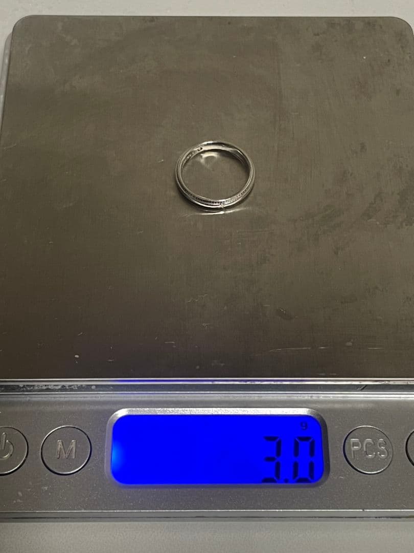 プラチナ　ミル打ちリング ダイヤモンド付き