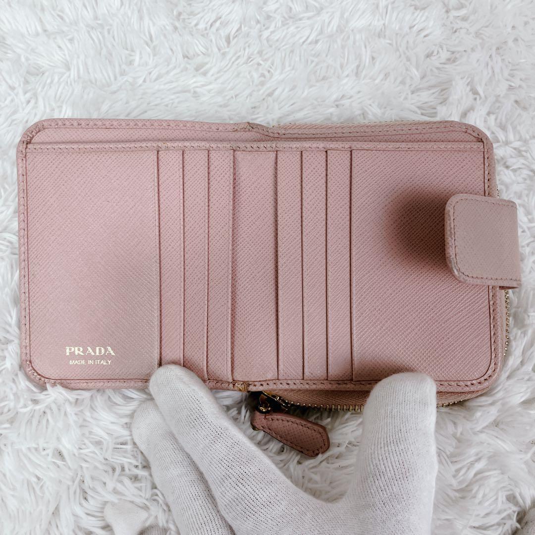 プラダ 二つ折り財布 ラウンドジップ　サフィアーノレザー ピンク 1ML522