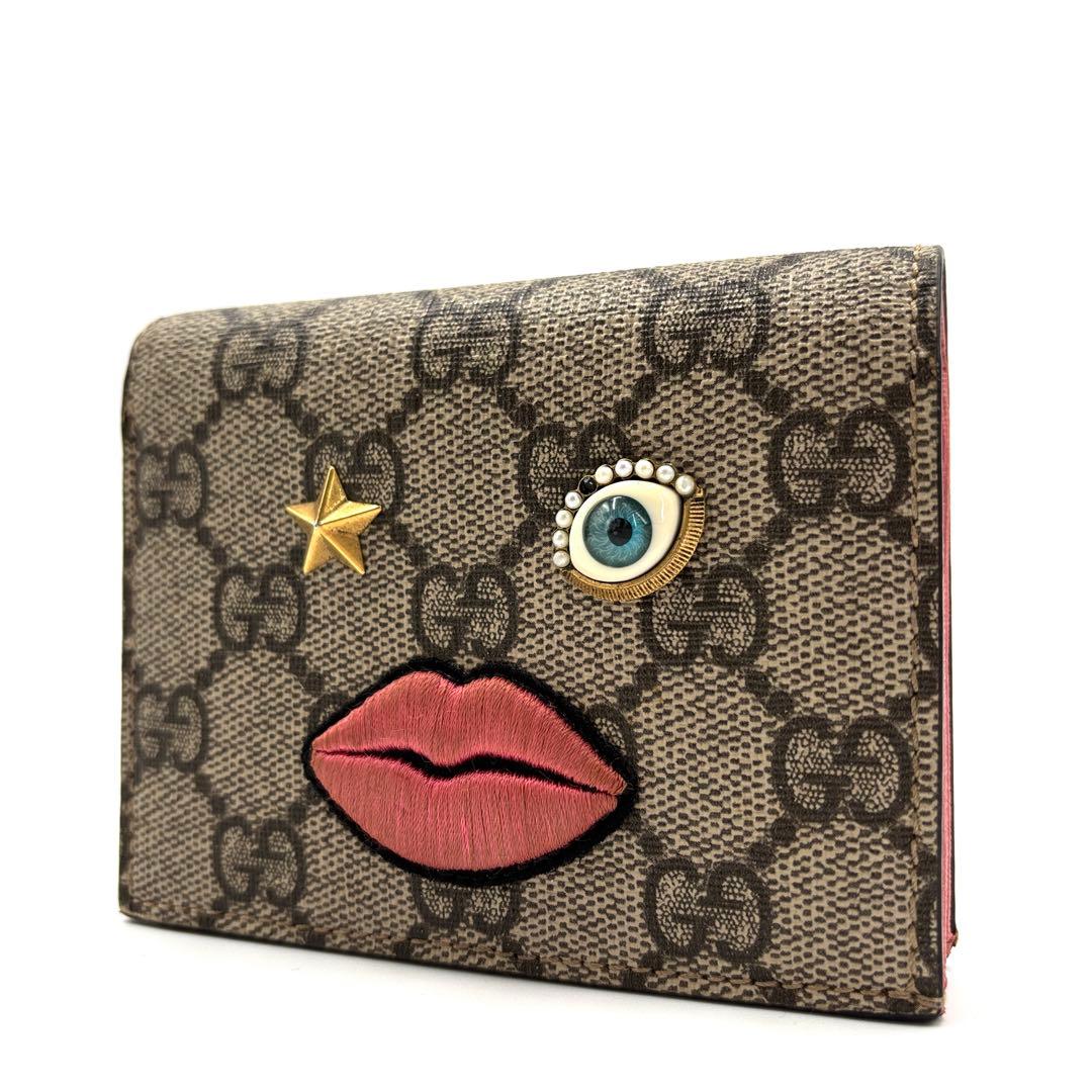 美品 グッチ 二つ折り財布 GGスプリーム 目 唇 バイカラー レディース