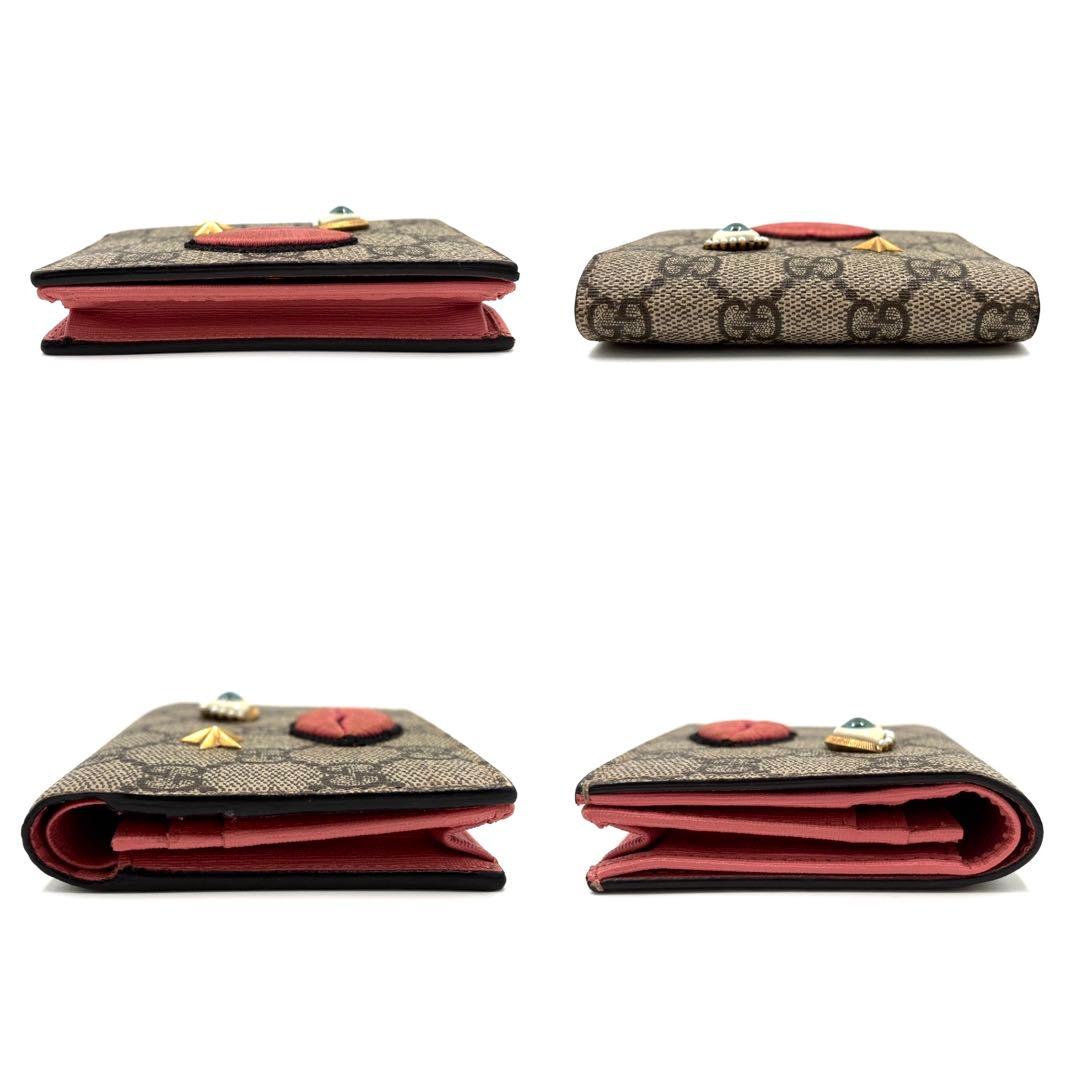 美品 グッチ 二つ折り財布 GGスプリーム 目 唇 バイカラー レディース