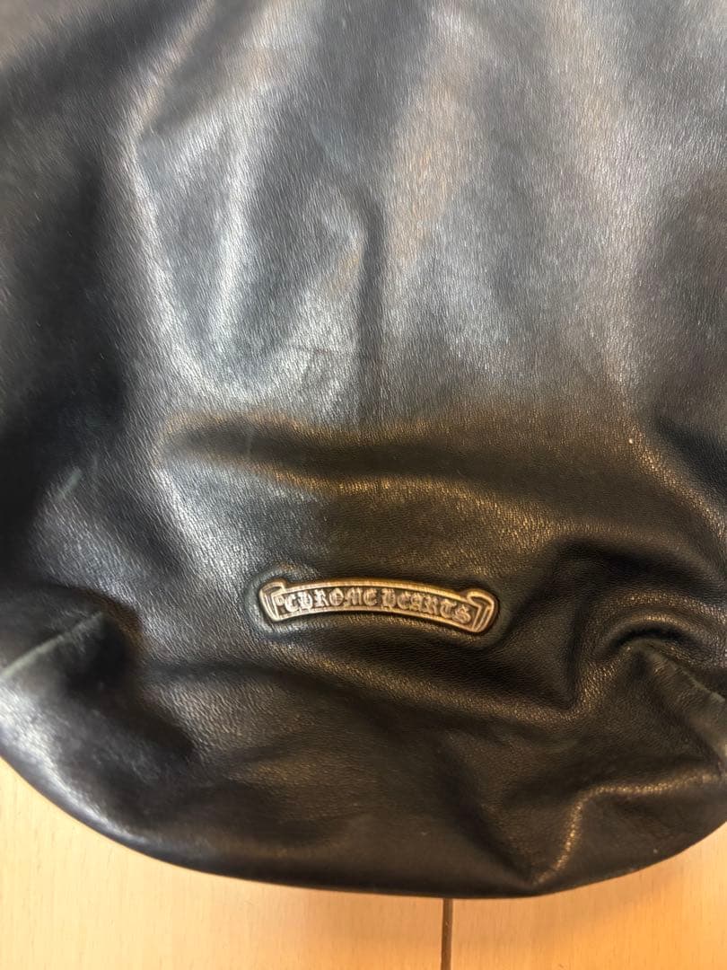 クロスパッチドローストリングサックレザー巾着ハンドバッグ