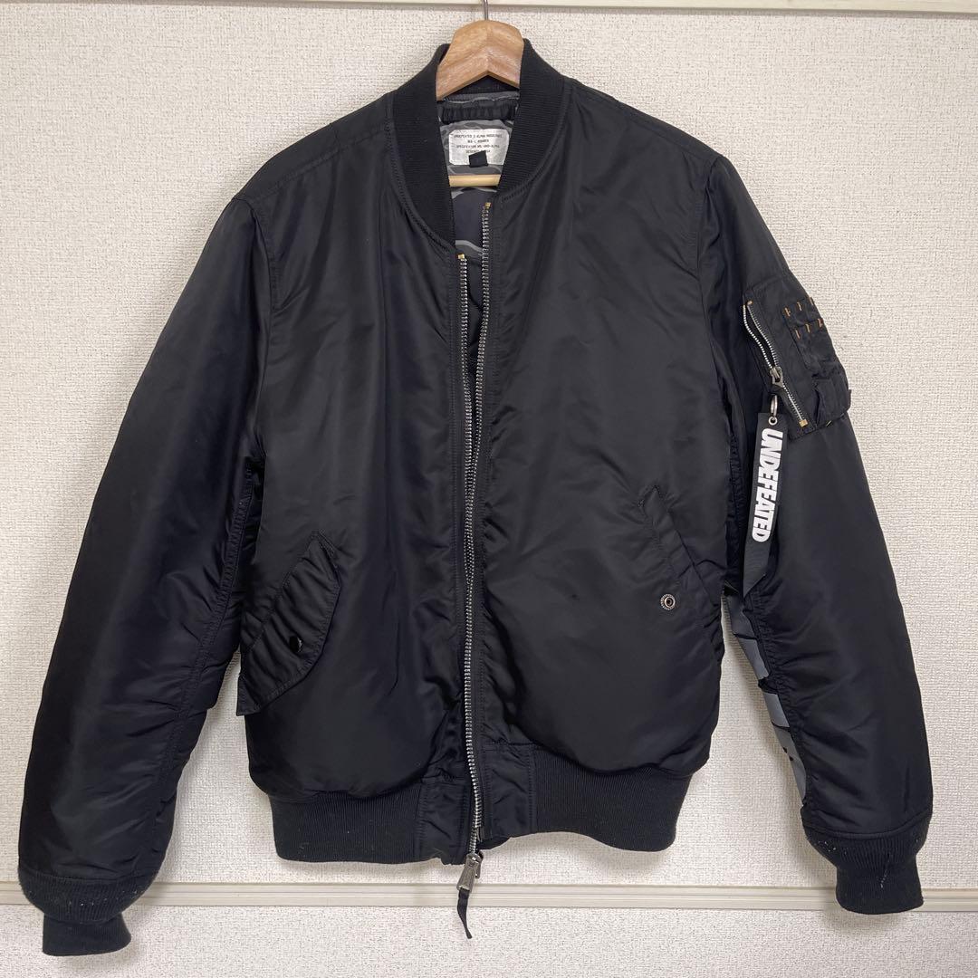 ジャケット・アウター UNDEFEATED X ALPHA INDUSTRIES MA-1