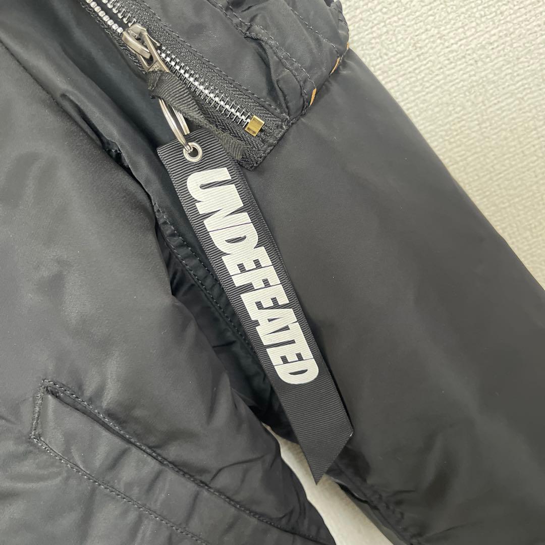 ジャケット・アウター UNDEFEATED X ALPHA INDUSTRIES MA-1