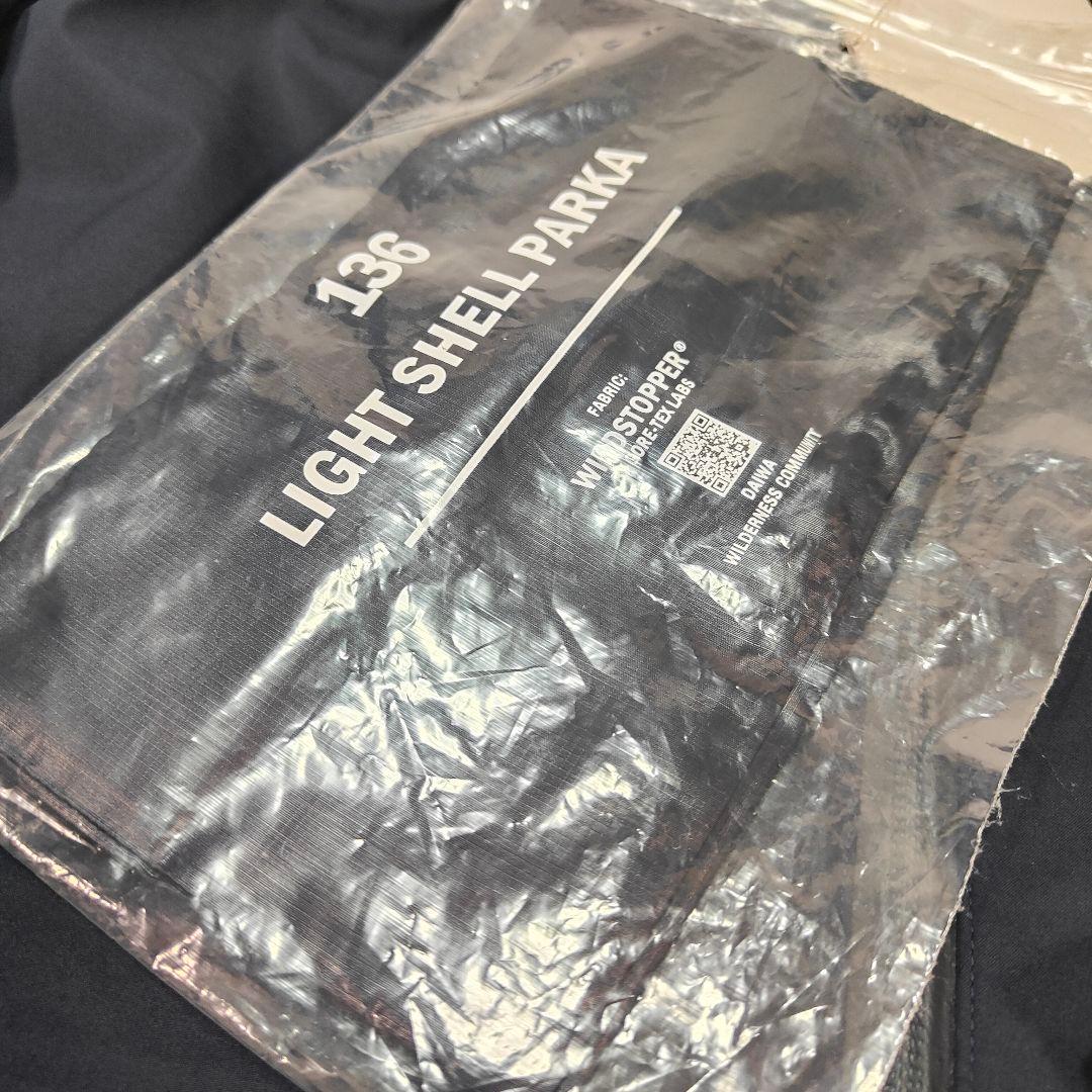 新品✨24年✨携帯袋✨ダイワライフスタイル ライトシェルパーカ L
