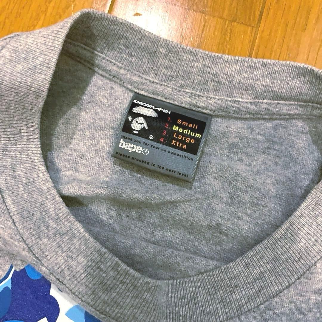 トップス APE x KAWS