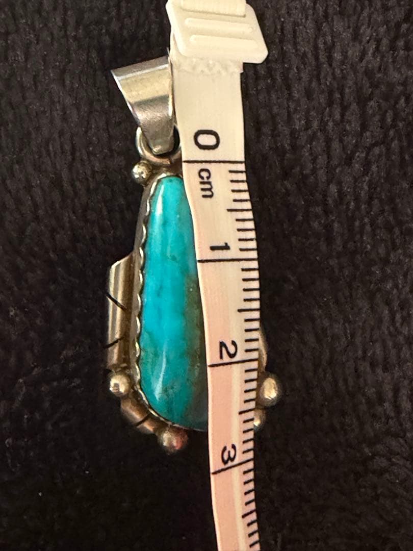 ⓐインディアンジュエリー　ナバホ族　レベッカグッドラック氏作ターコイズペンダント