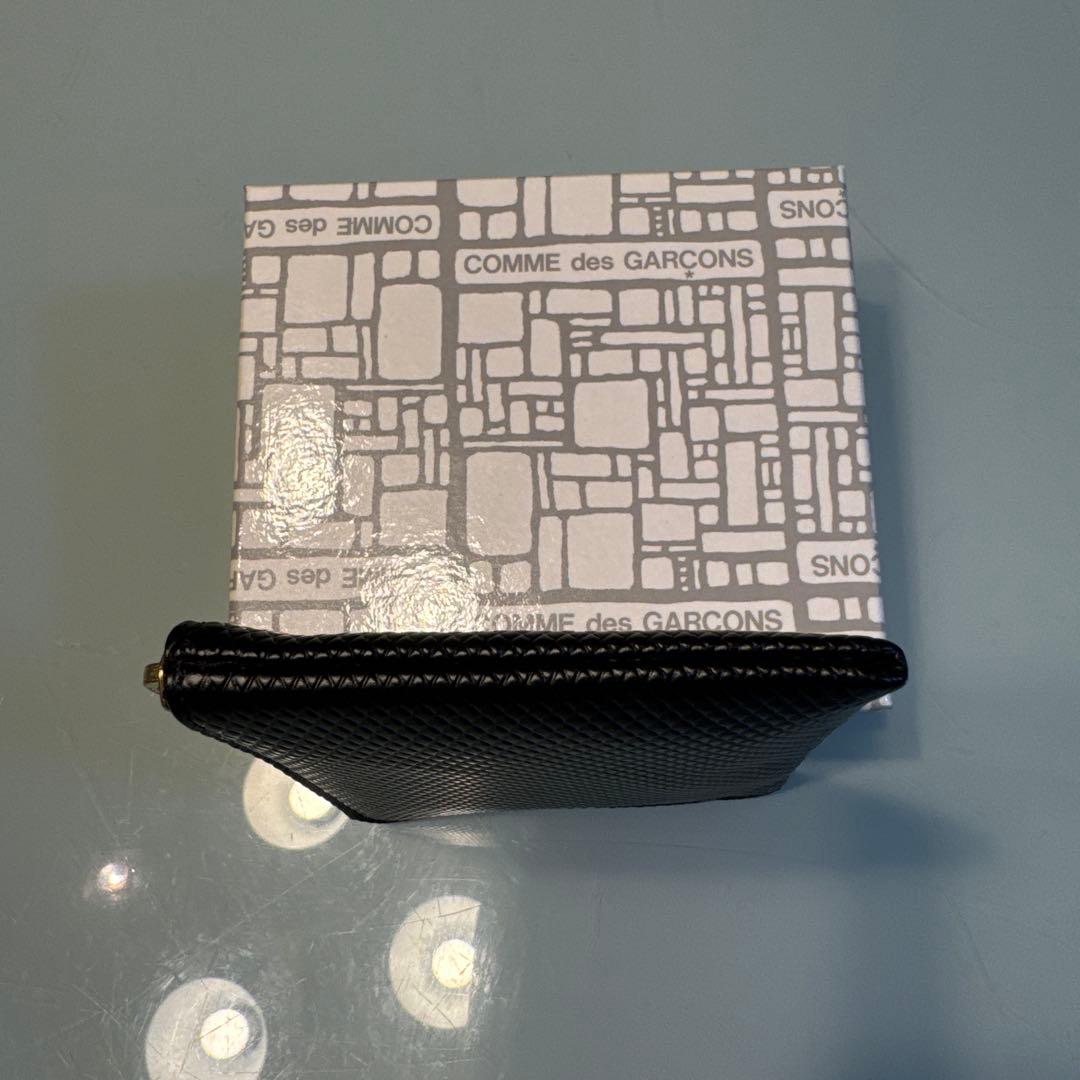 新品・未使用COMME des GARÇONS ブラックケース
