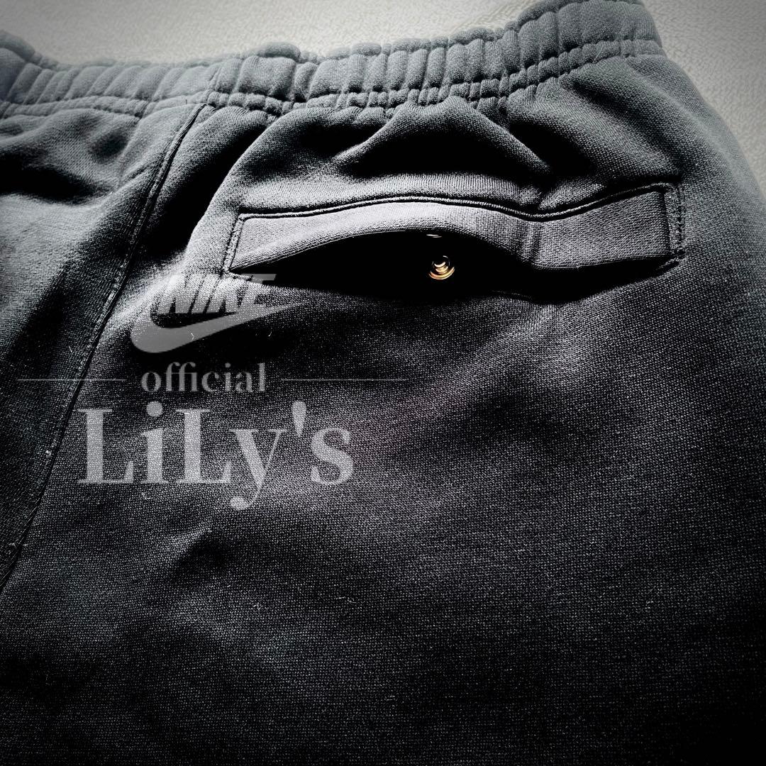 【Ｍサイズ】新品未使用　ナイキ上下セットアップ　ブラック✖︎オレンジ　黒　ロゴ刺繍