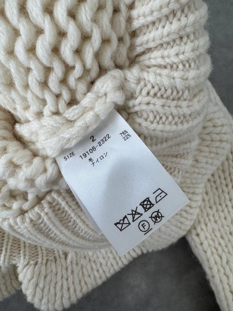 CLANE PEPLUM HAND KNIT TOPSアイボリー サイズ2