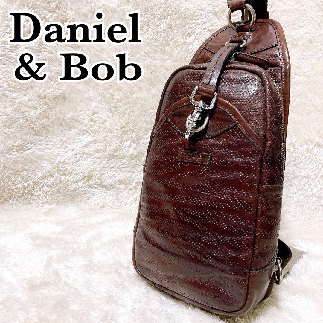 ダニエル＆ボブ ピッポ ボディバッグ スリングバッグ レザー パンチング 茶