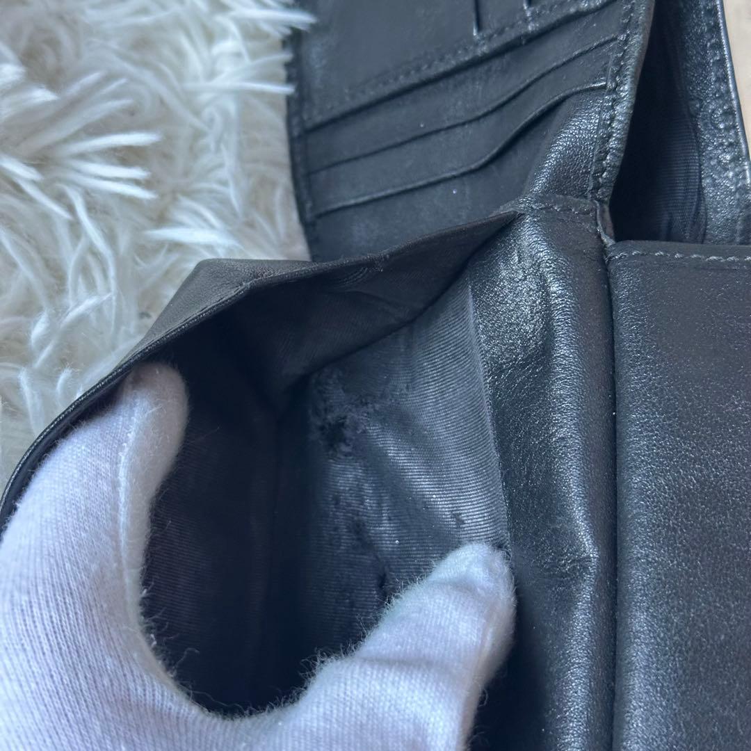 グッチ GGシマ 二つ折り財布 型押し レザー コンパクト 黒 総柄 エンボス