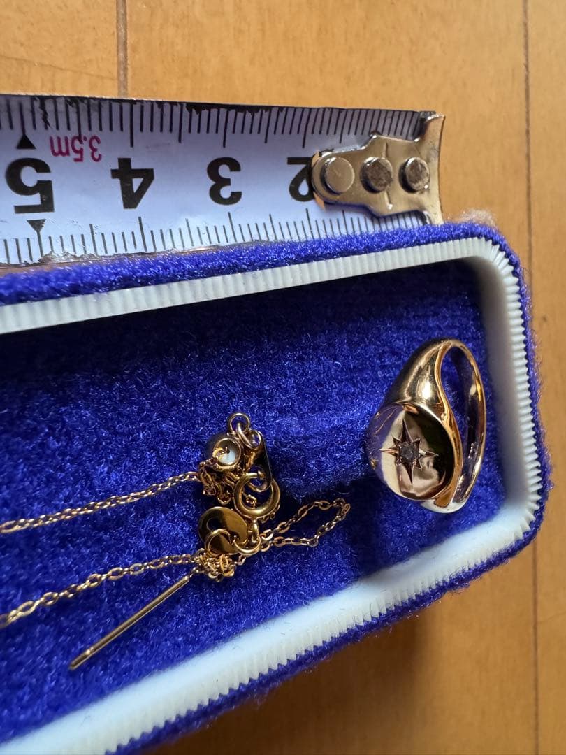 金色の星のコンパスデザインのリングとネックレスセット