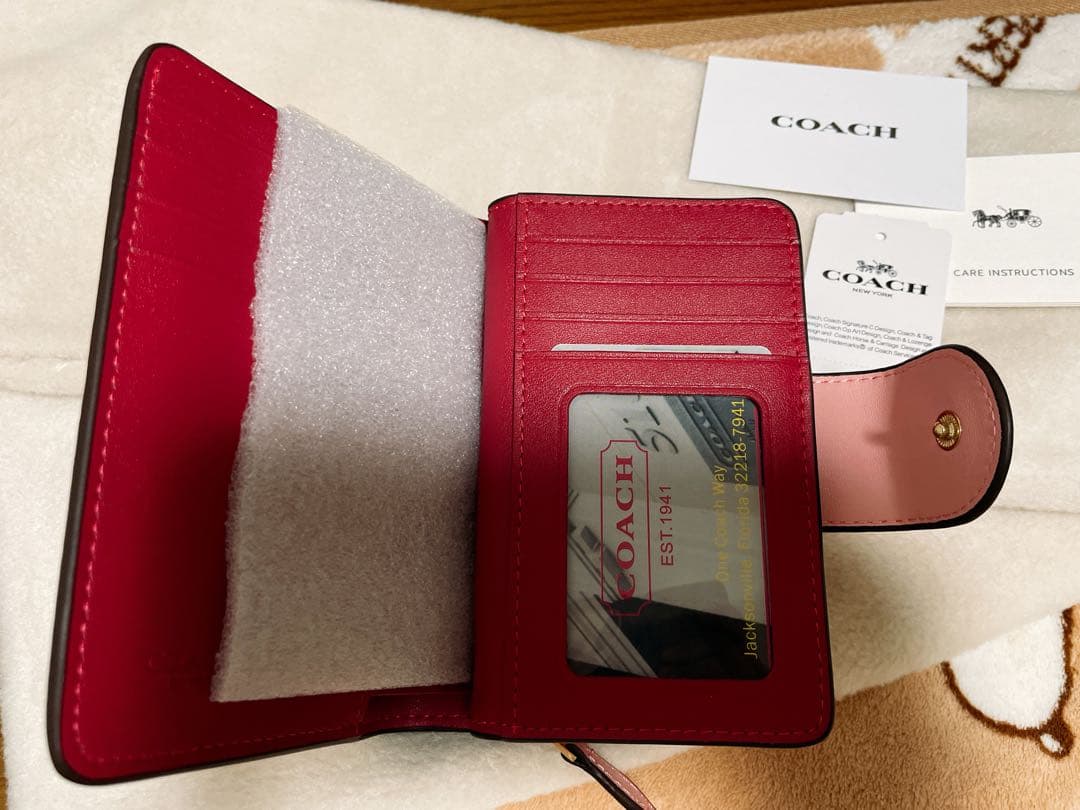 ★COACH ピンク 二つ折り財布 並行輸入品:アウトレット★