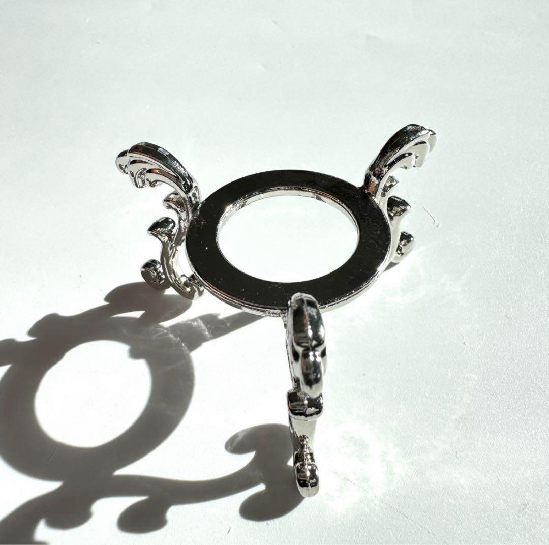 虹入り キャンディフローライト スフィア 53.6mm 金属台座付き