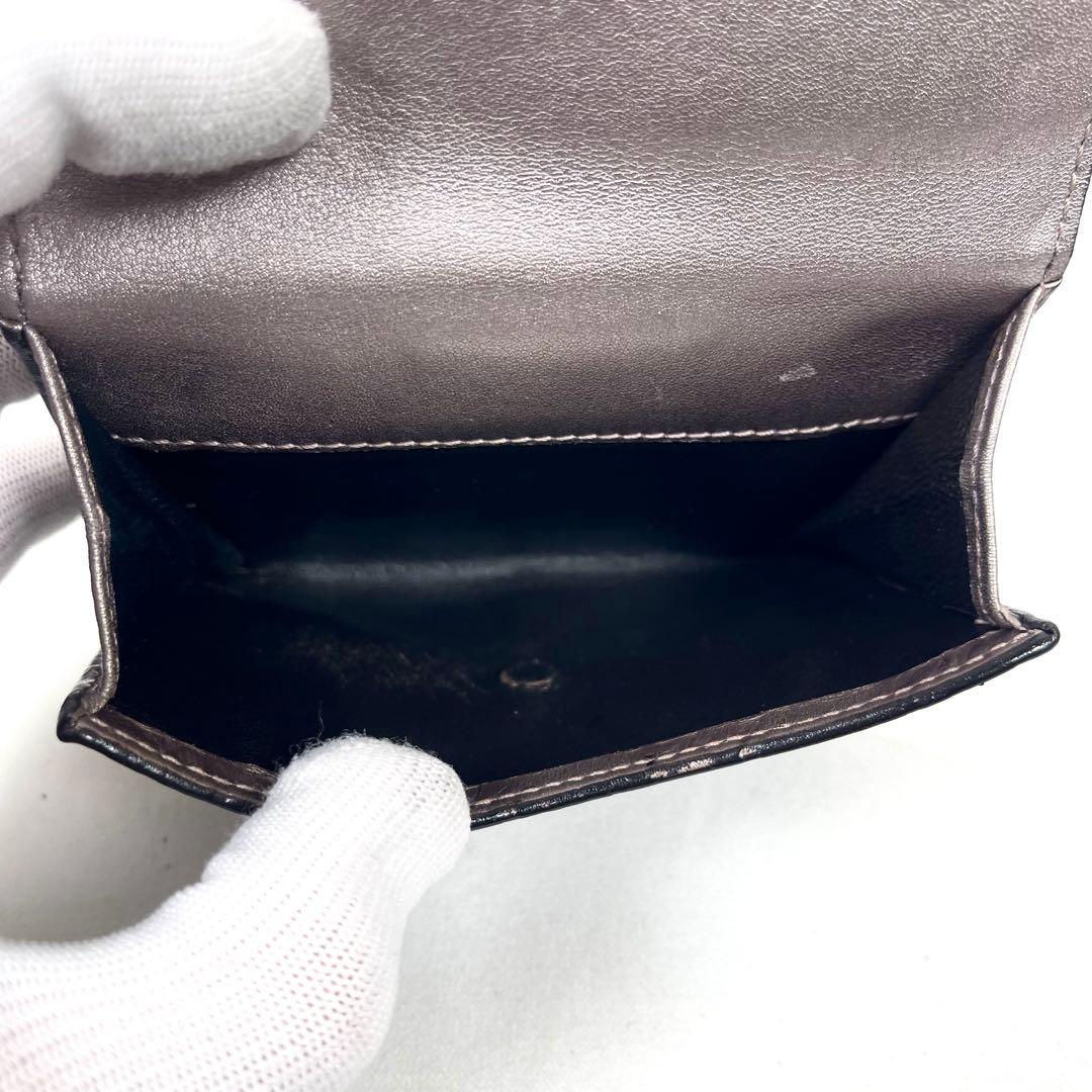 グッチ　折り財布　ハートロゴプレート　GGシマレザー　総柄エンボス　コンパクト