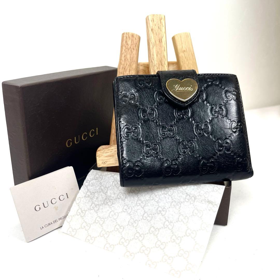 グッチ　折り財布　ハートロゴプレート　GGシマレザー　総柄エンボス　コンパクト