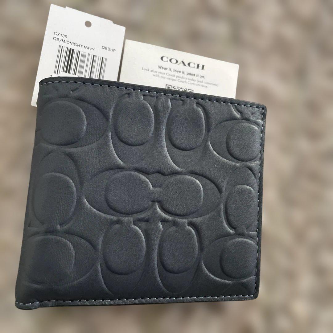 新品未使用　55,000円　COACH ミッドナイトネイビー 二つ折り財布